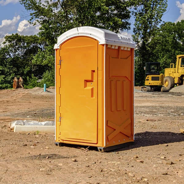 how often are the portable restrooms cleaned and serviced during a rental period in Sutton